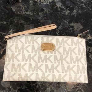 Michael Kors medium logo zip pouch.